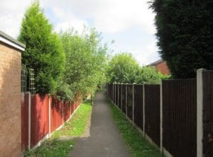 By A public footpath off Lowry Road by Ian S, CC BY-SA 2.0, https://commons.wikimedia.org/w/index.php?curid=114295925 